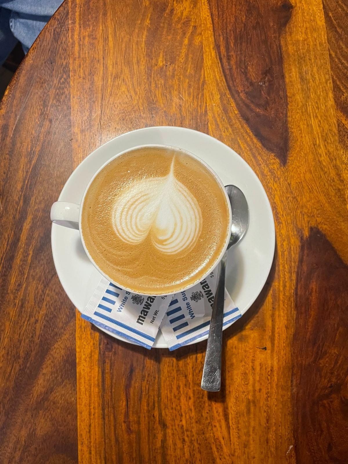 A latte with heart art