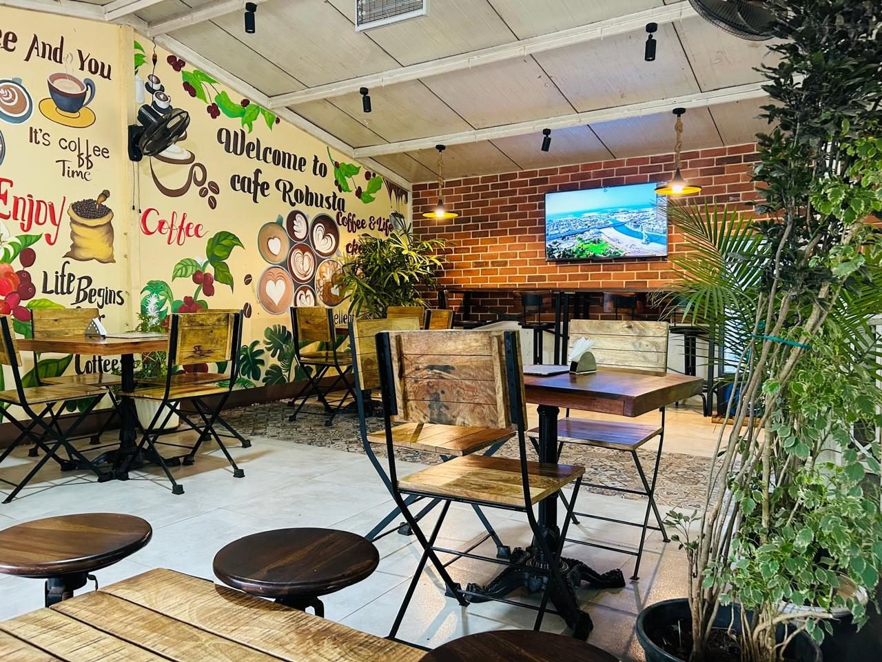 The Welcome to Cafe Robusta coffee mural wall